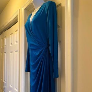 Teal faux wrap dress with wraparound attached sash and v neck. Draped front